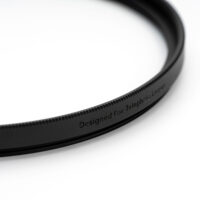 Designed For Telephoto Lenses engraving on the NiSi NC UV brass frame