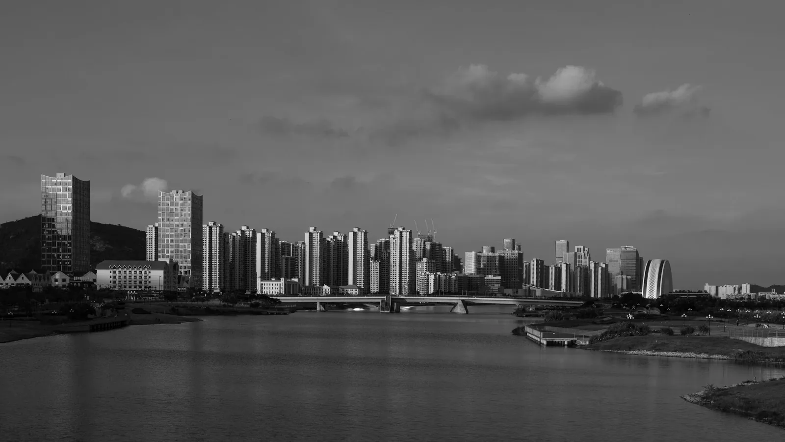 The same skyline with a red filter, the sky at its darkest and the clouds strongest