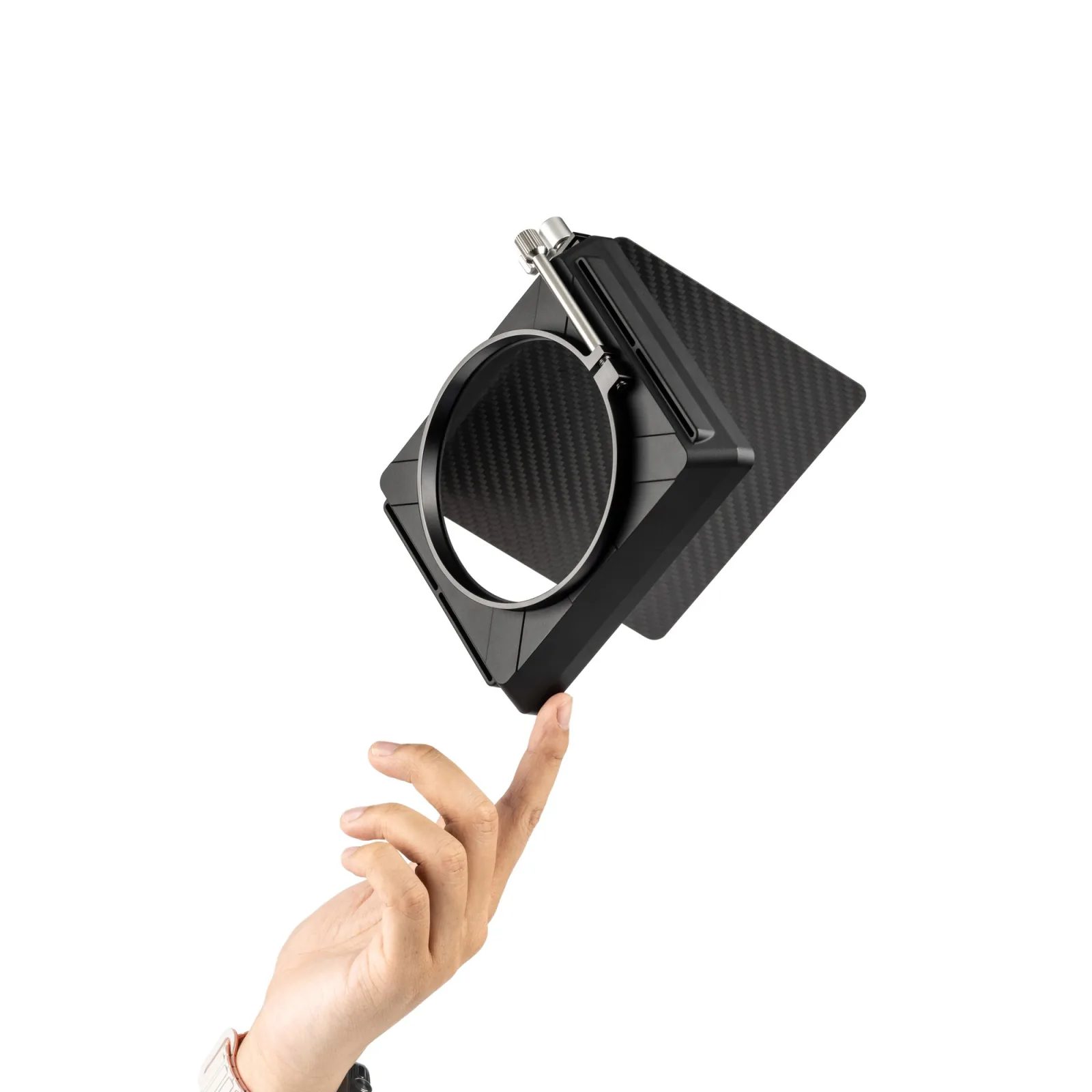The NiSi JetMag Pro Matte Box balanced on a fingertip