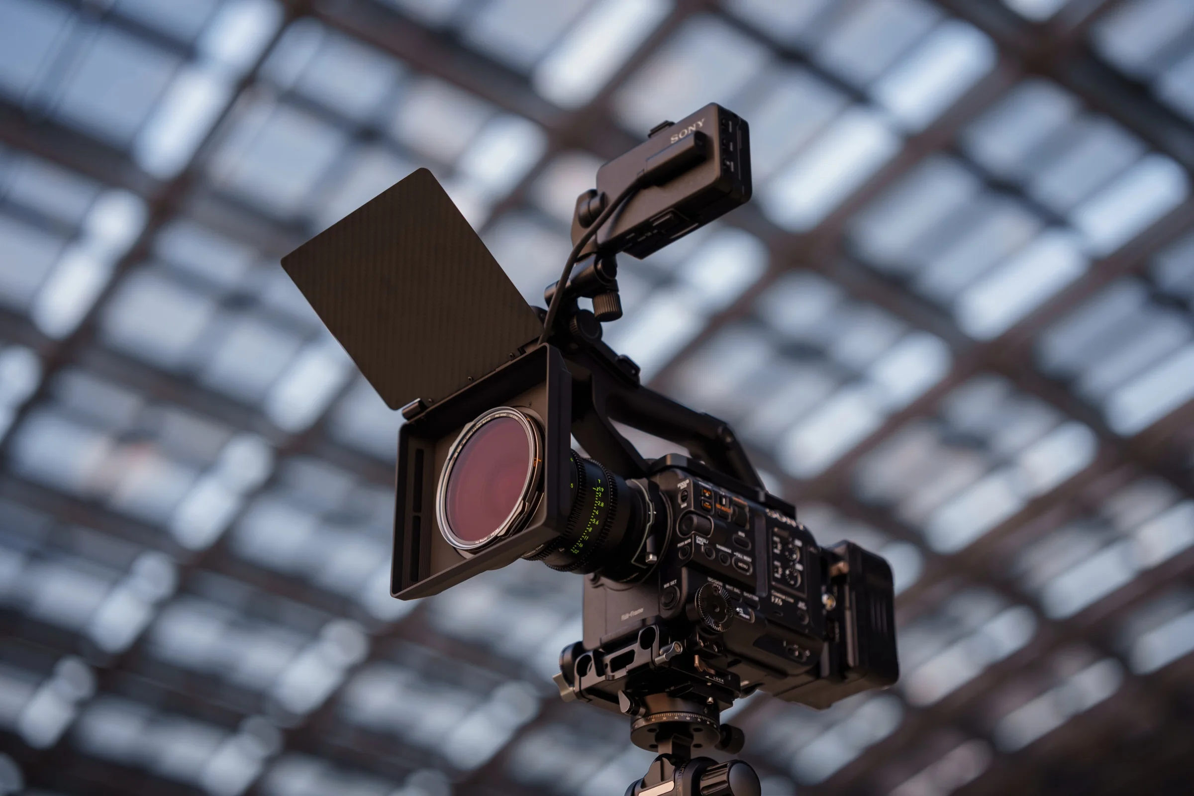NiSi JetMag Pro Matte Box with carbon fibre top flag and a filter on a cinema camera under a glass roof